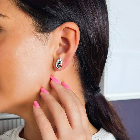 18k white gold teardrop stud earrings with blue sapphire and diamond halo, additional view