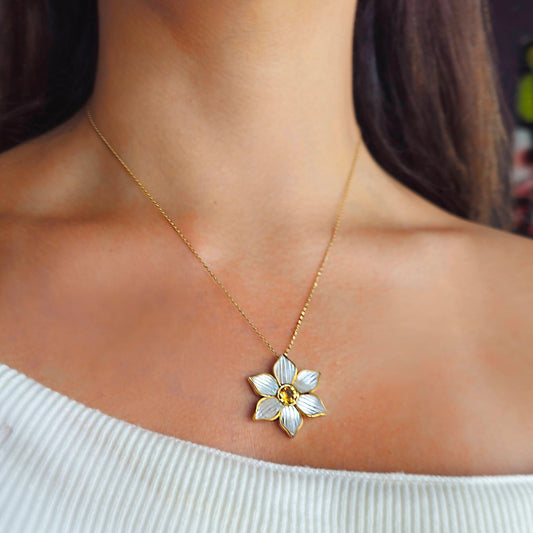 18k gold pendant necklace with carved mother of pearl petals and a citrine center, additional view