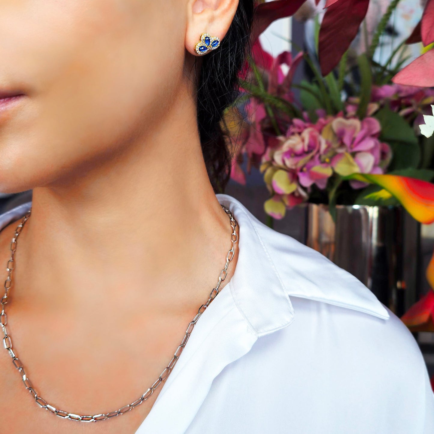 18k white gold teardrop earrings with blue sapphires and diamond halos, additional view