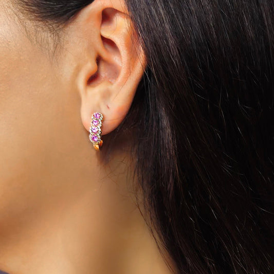 18k gold earrings with pink sapphire gemstones and diamond accents, additional view