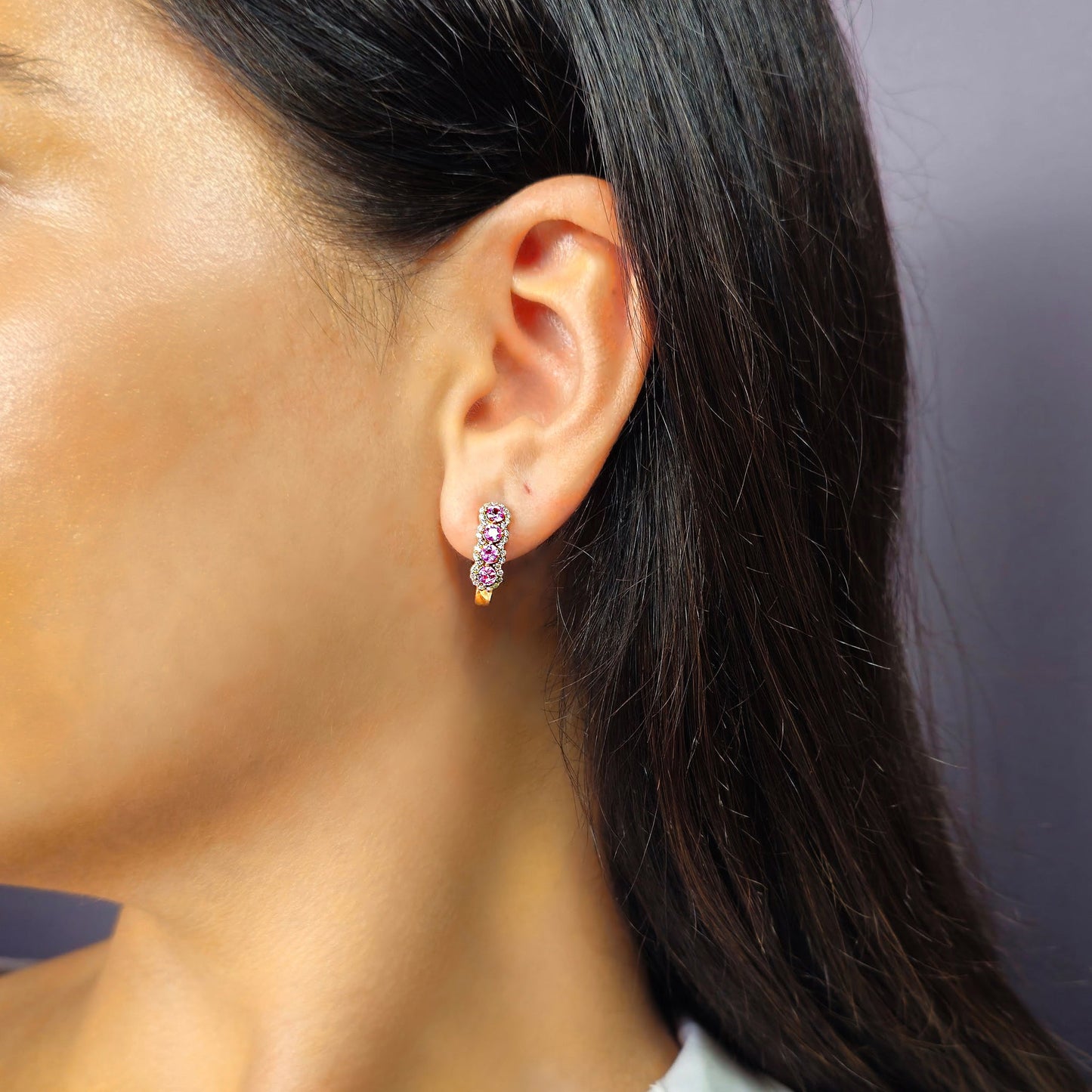 18k gold earrings with pink sapphire gemstones and diamond accents, additional view