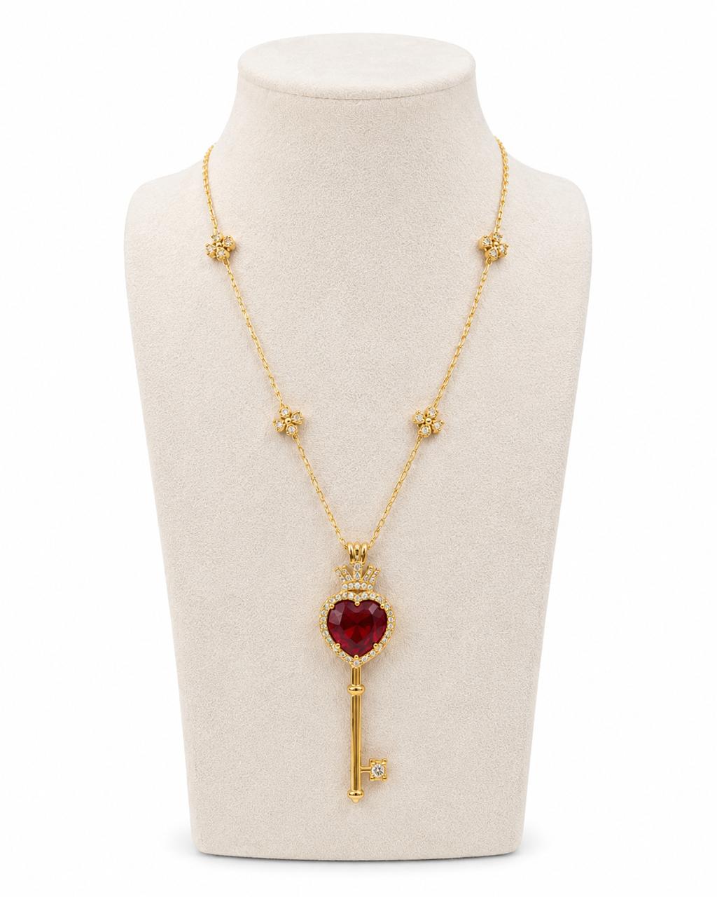 18k gold key-shaped necklace with ruby, additional view
