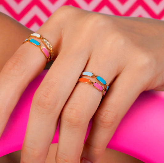 18k gold ring with rotating orange and pink enamel design, additional view