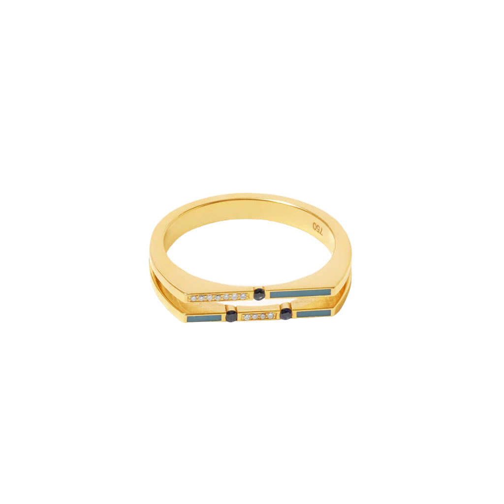 Gold ring with embedded stones on a white background