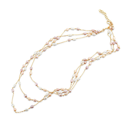 Multi-layered pearl necklace with gold chain on a white background