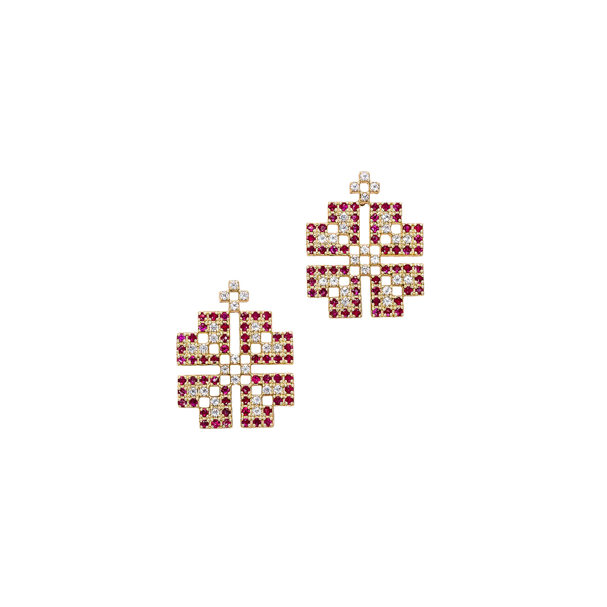 Pair of earrings with red gemstones on a white background