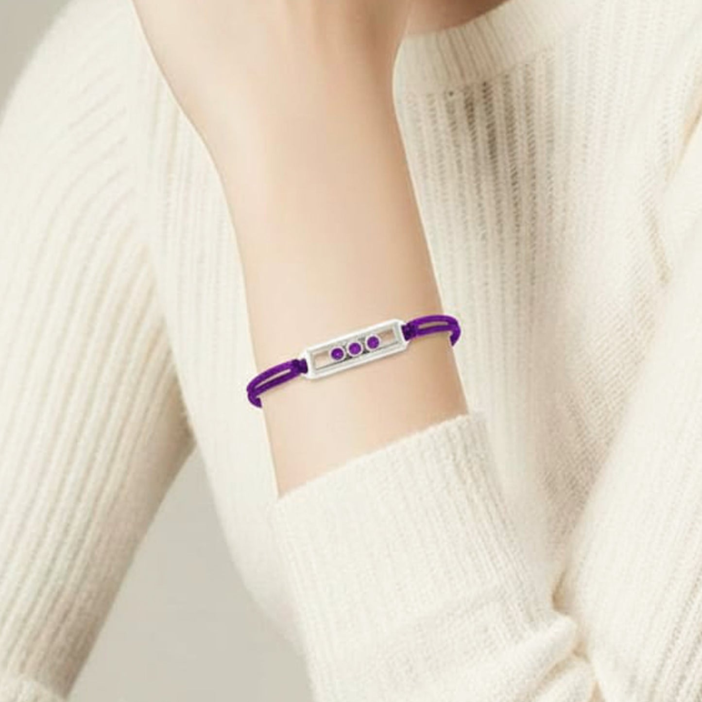 18k white gold cage-design bracelet with purple sapphires and diamonds, additional view