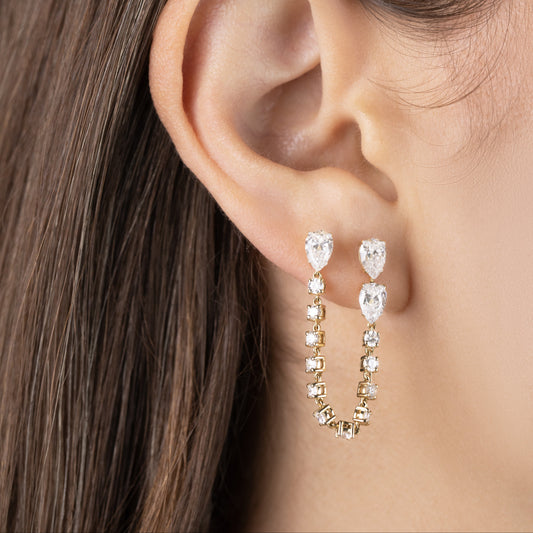 White Drop pear chain earring worn in an original lifestyle image