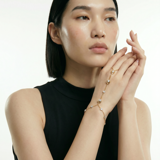 ZORÁE Unbound Muse 18K yellow gold bracelet worn on model