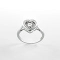 Heart-shaped diamond ring on a white background