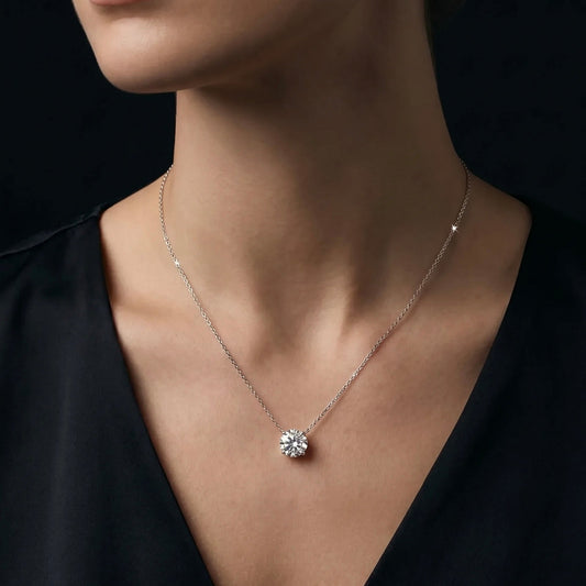 Close-up of a necklace with a diamond necklace on a black background