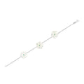 18k white gold bracelet with three mother of pearl star flowers and emeralds, additional view