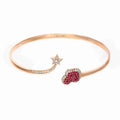 18k rose gold open bangle with a ruby heart and diamond-set star, additional view