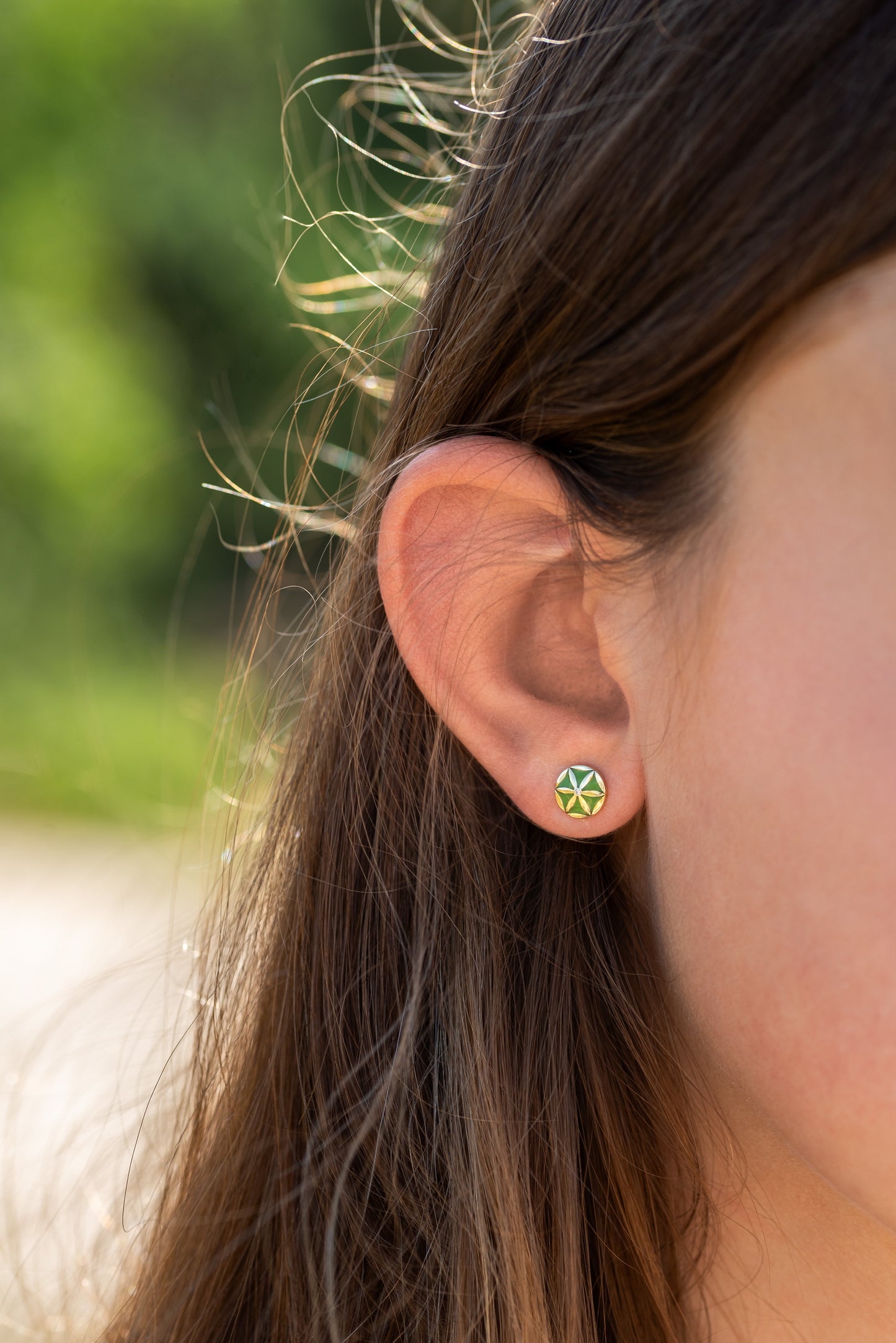 7LEAVES Flower of Elements earrings worn on the ear