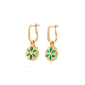 7LEAVES Palimpsest matte yellow gold earrings with emeralds on a white background, front view