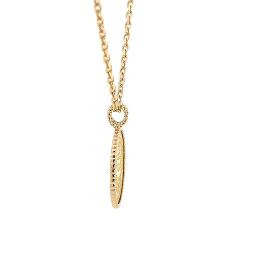 Gold necklace with a unique pendant on a white background