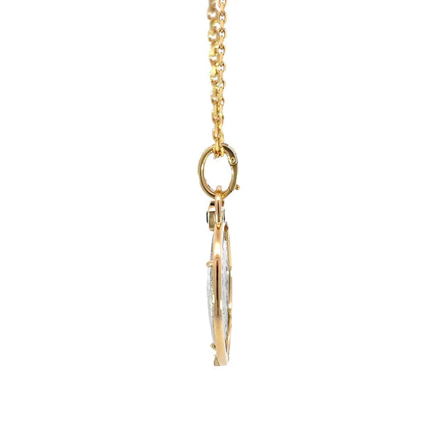 Gold necklace with a pendant on a white background