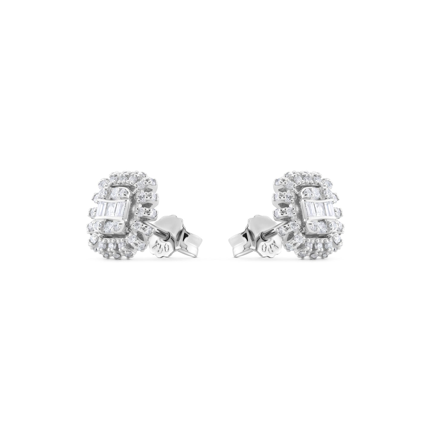 Pair of white gold earrings with gemstones on a white background
