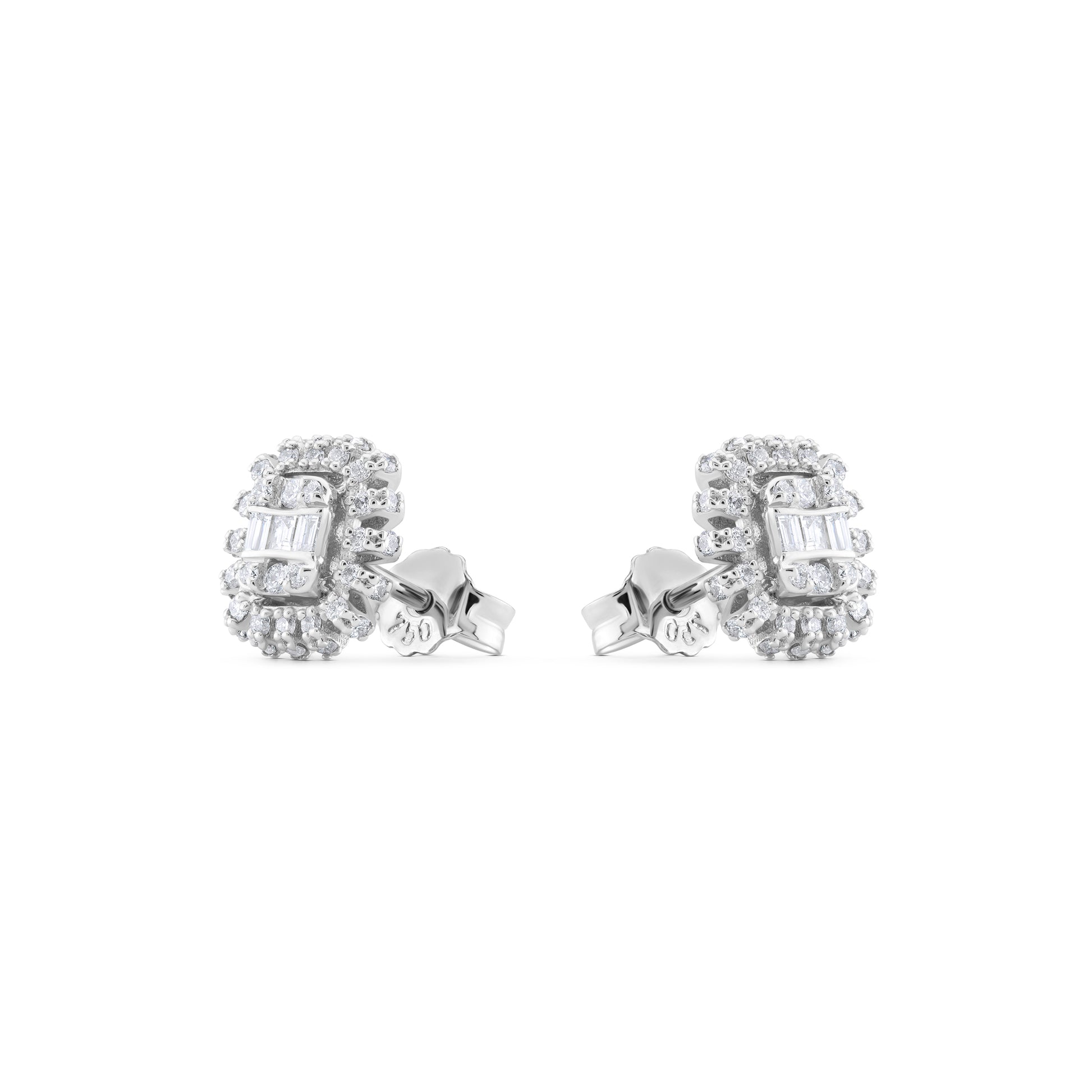 Pair of white gold earrings with gemstones on a white background