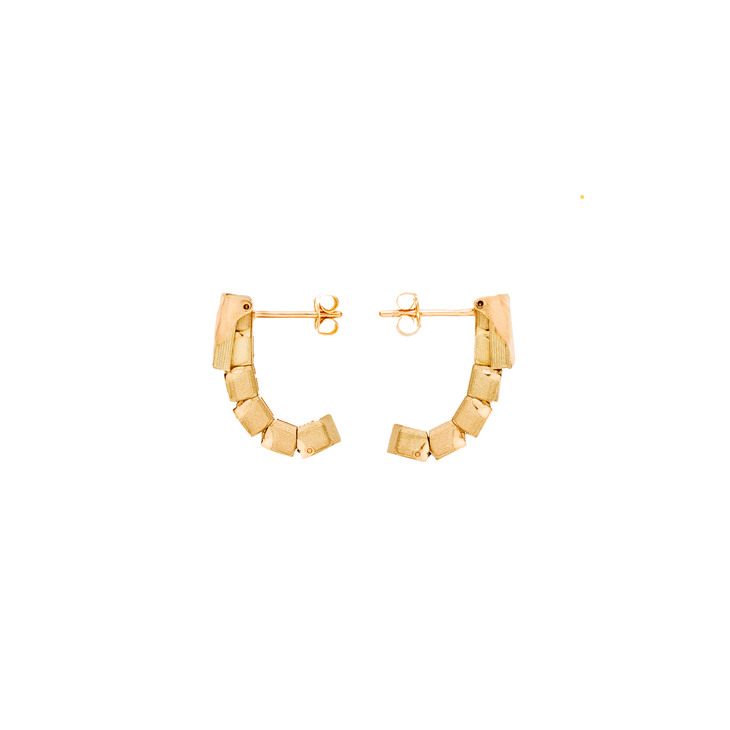 Gold hoop earrings on a white background
