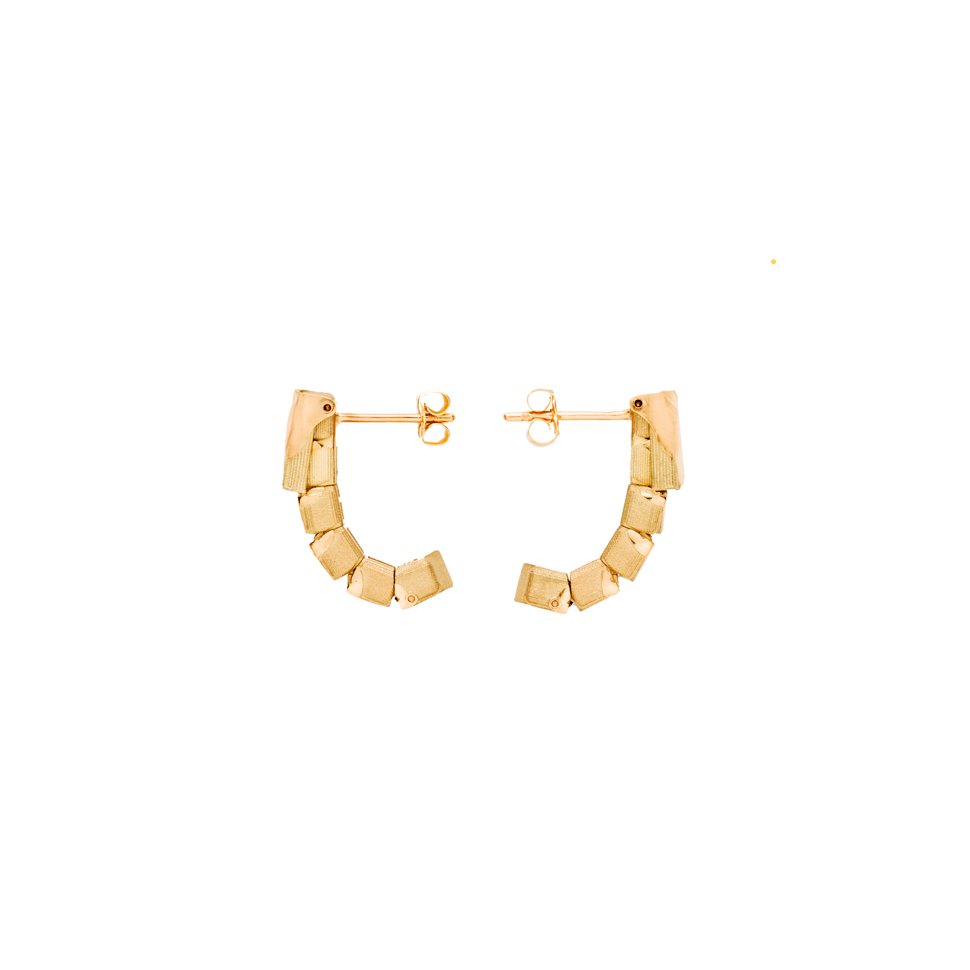 Gold hoop earrings on a white background