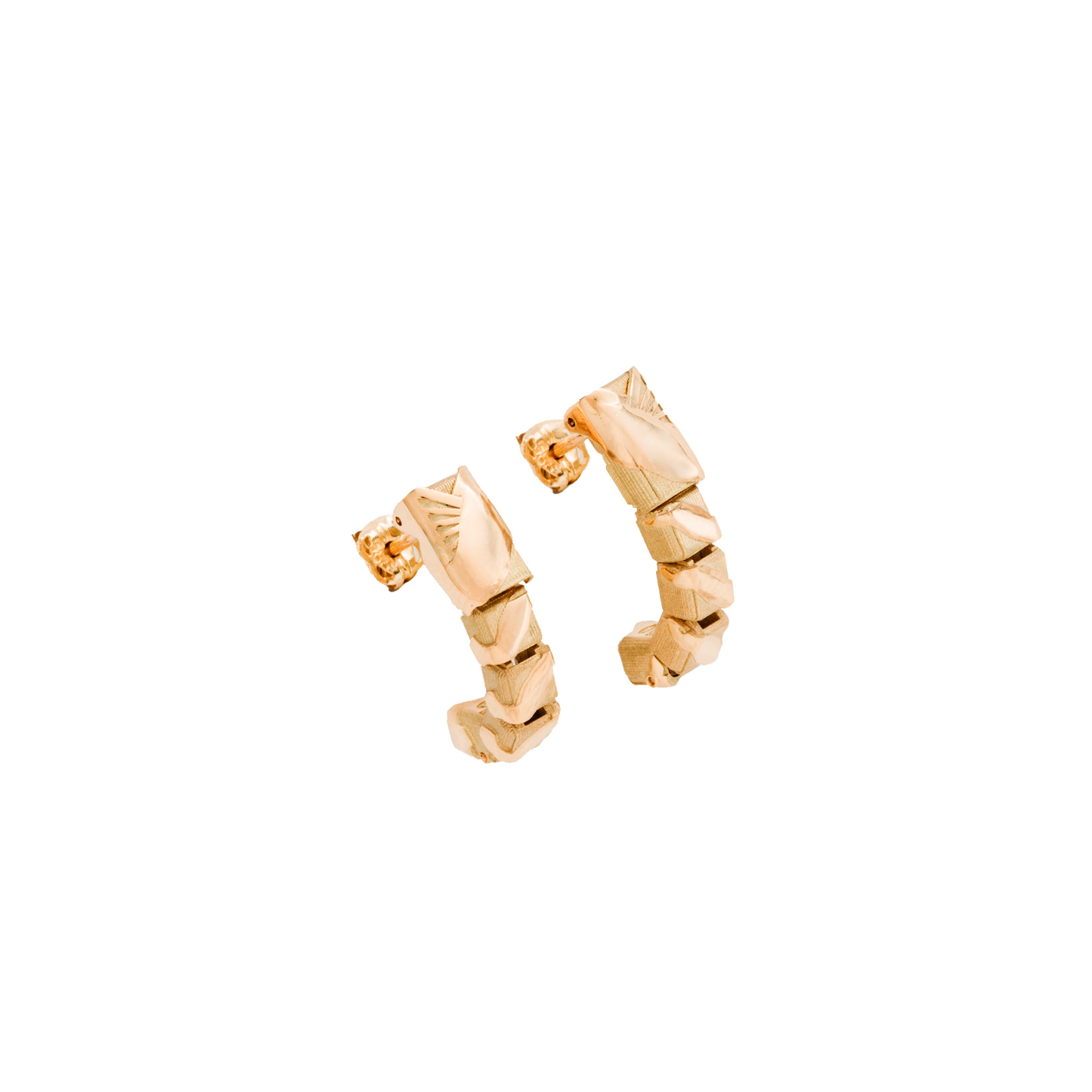 Gold hoop earrings on a white background