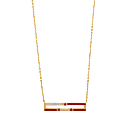 Gold necklace with a red and gold pendant on a white background