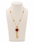18k gold key-shaped necklace with ruby, additional view