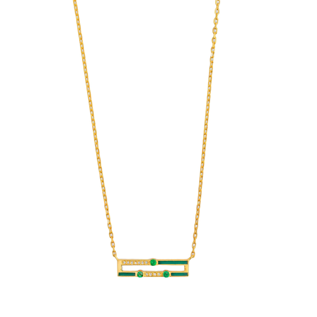 Gold necklace with green gemstones on a white background