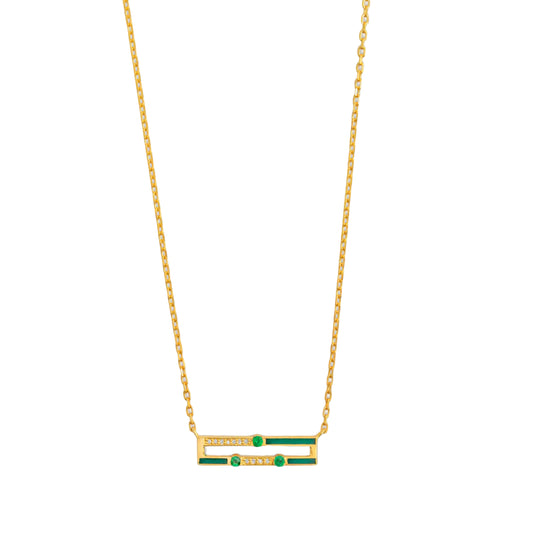Gold necklace with green gemstones on a white background