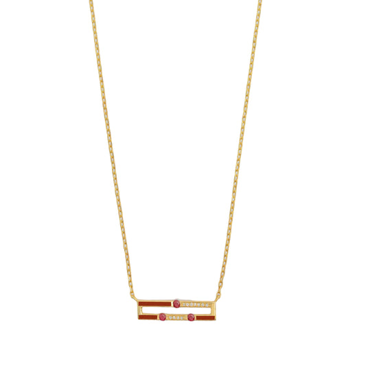 Gold necklace with red and white accents on a white background