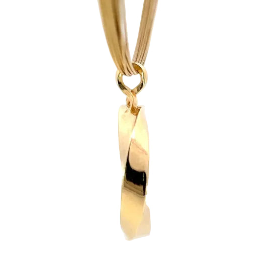 Gold necklace with a pendant on a white background