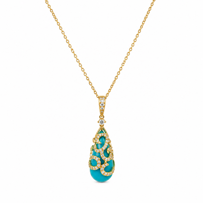 Gold necklace with a turquoise pendant on a white background