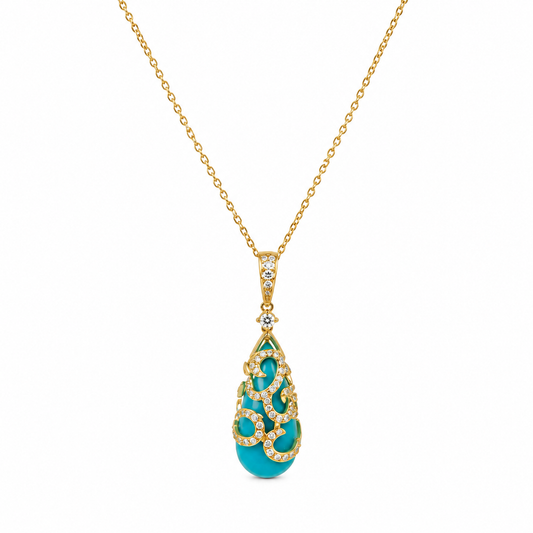 Gold necklace with a turquoise pendant on a white background