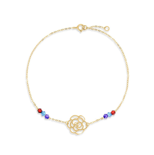 Gold bracelet with a floral design and colorful beads on a white background