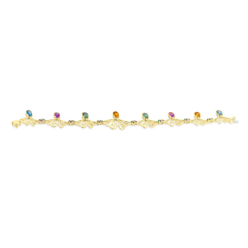Gold bracelet with colorful gemstones on a white background