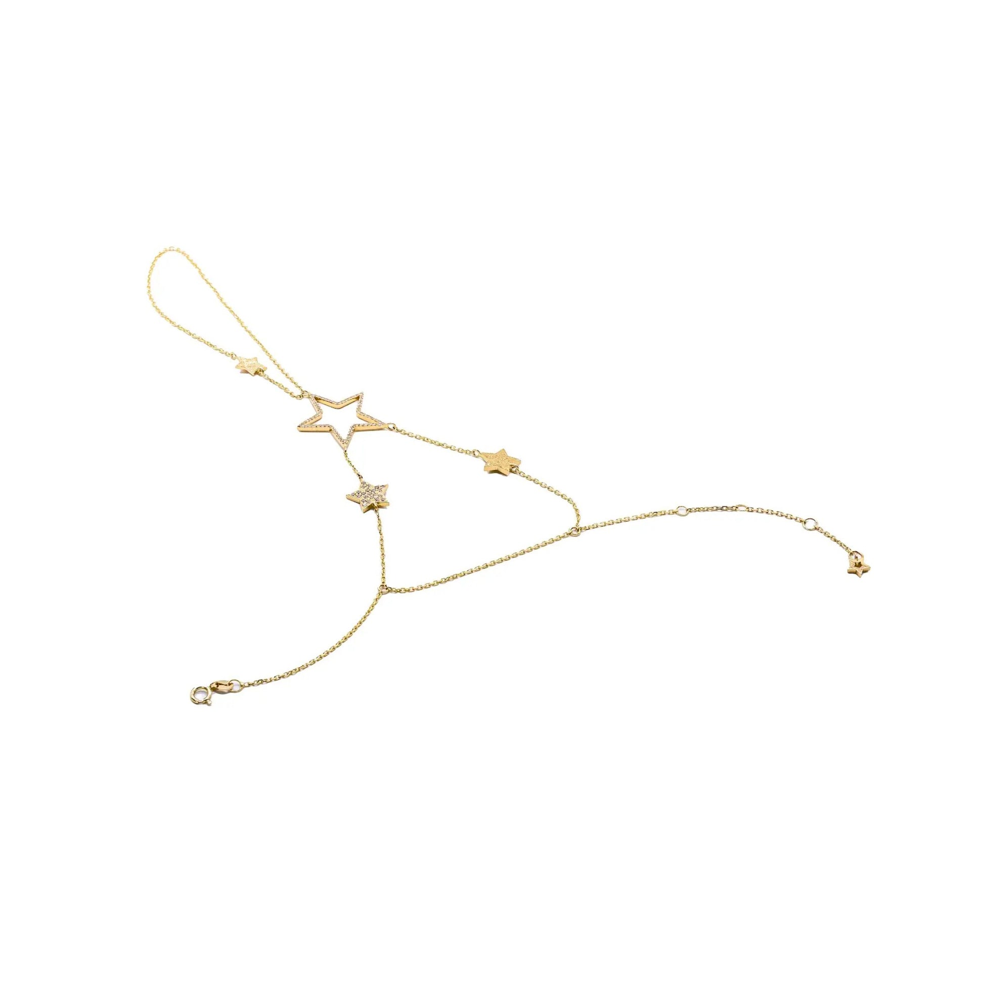 Gold anklet with star-shaped charms on a white background