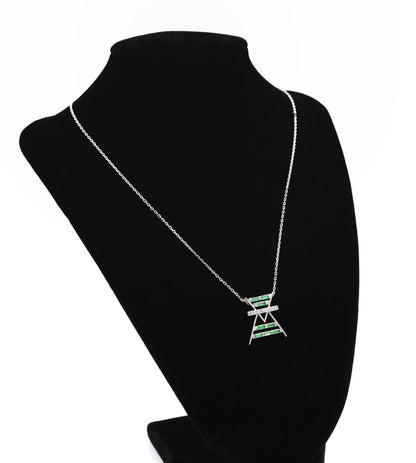 Necklace with a pendant on a black mannequin bust