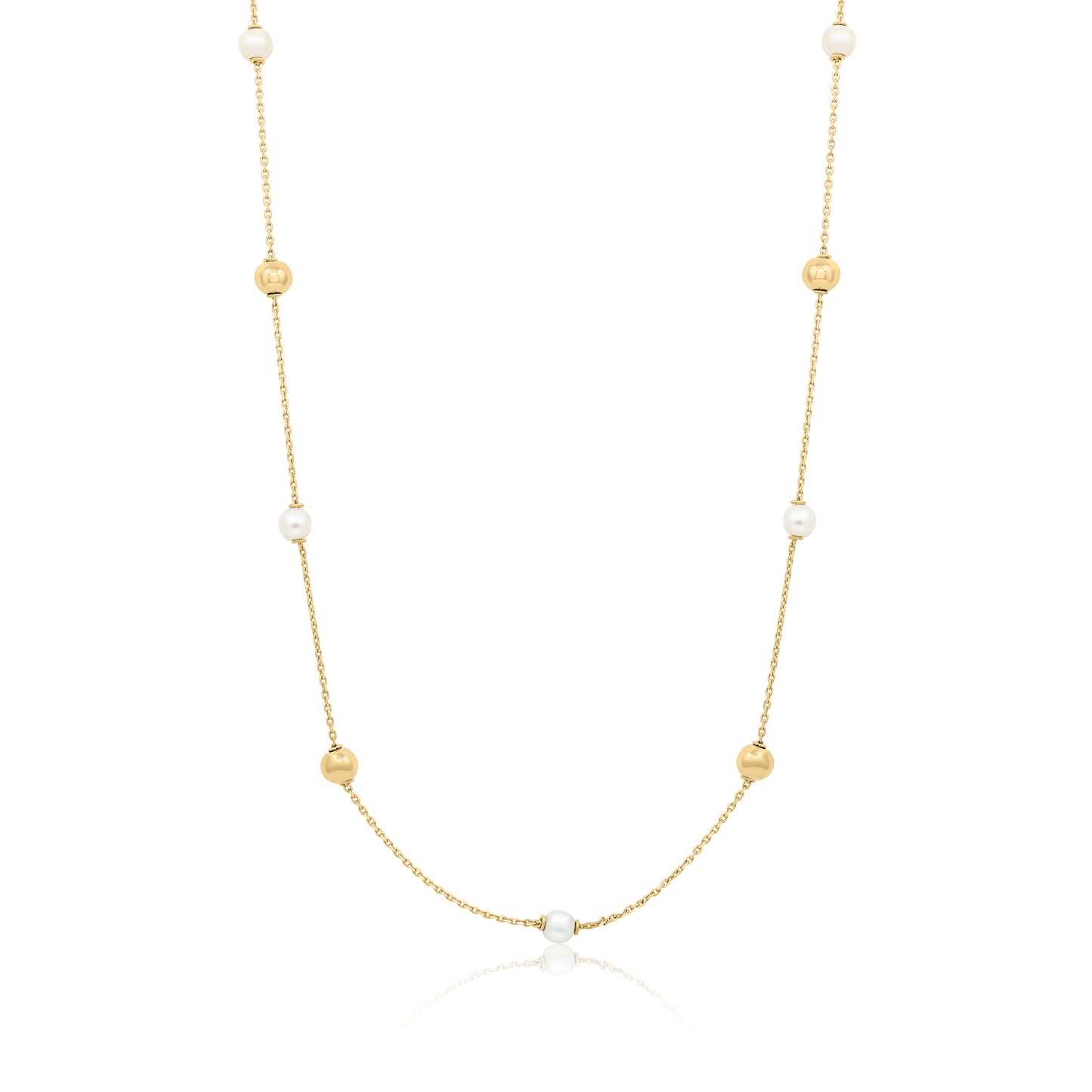 Gold necklace with pearls on a white background