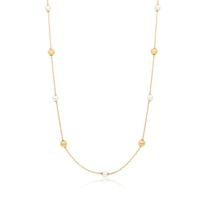 Gold necklace with pearls on a white background
