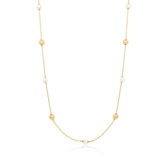 Gold necklace with pearls on a white background