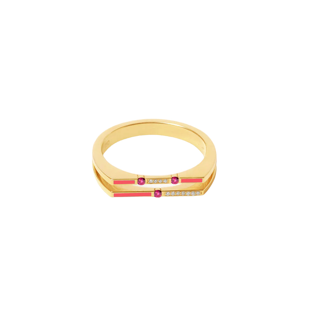 Gold ring with red gemstones and clear stones on a white background