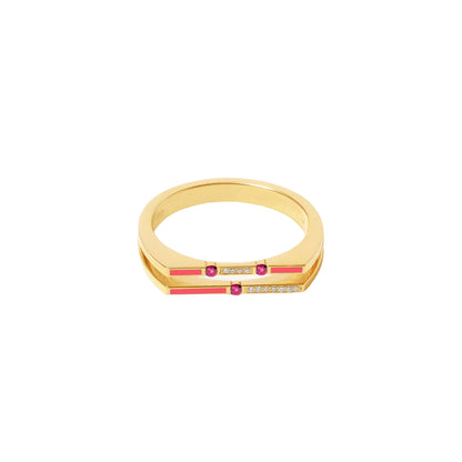 Gold ring with red gemstones and clear stones on a white background