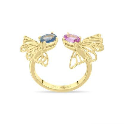 Gold butterfly earrings with gemstones on a white background