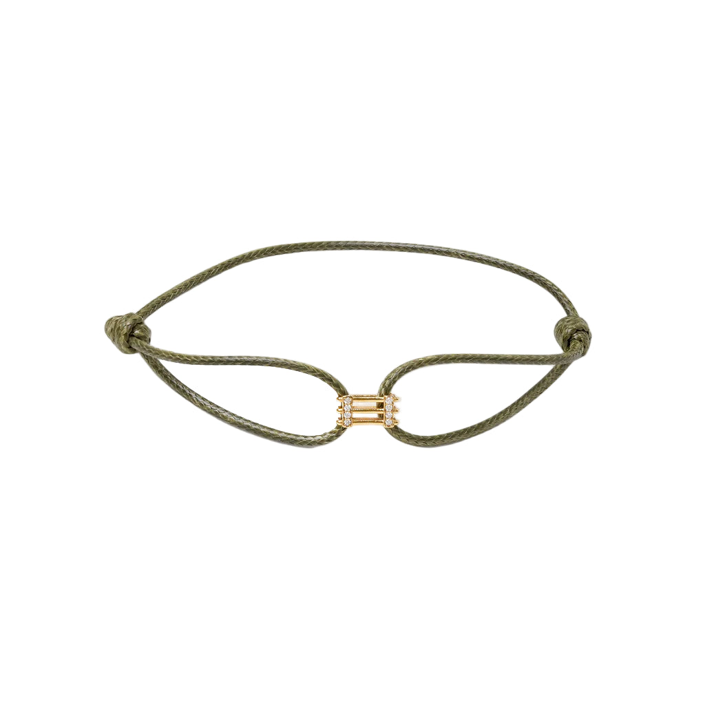 Bracelet with a gold clasp on a white background