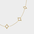 Gold necklace with square pendants