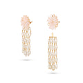 Pair of earrings with floral tops and pearl chains on a white background