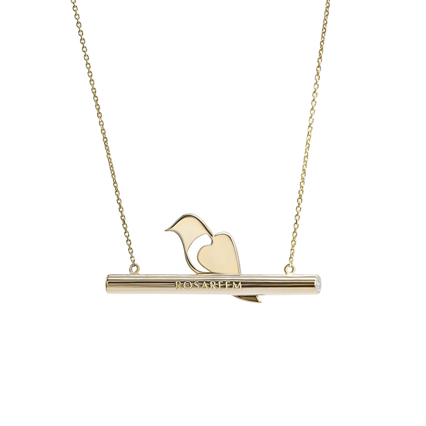 Back of gold necklace with a bird pendant on a white background