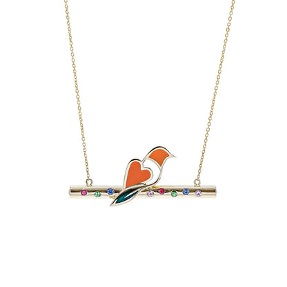 Necklace with a bird and heart pendant on a white background