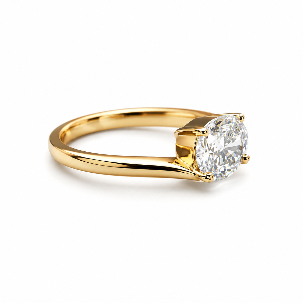 Gold ring with a diamond on a white background